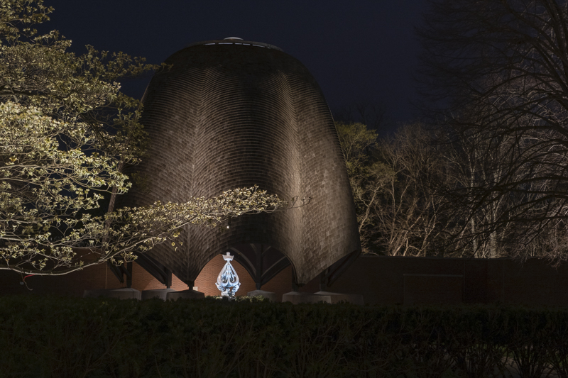 The chapel through a foreground of lit dogwood blossoms